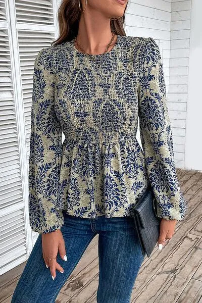 Work To Vacation Smocked Long Sleeve Peplum Blouse